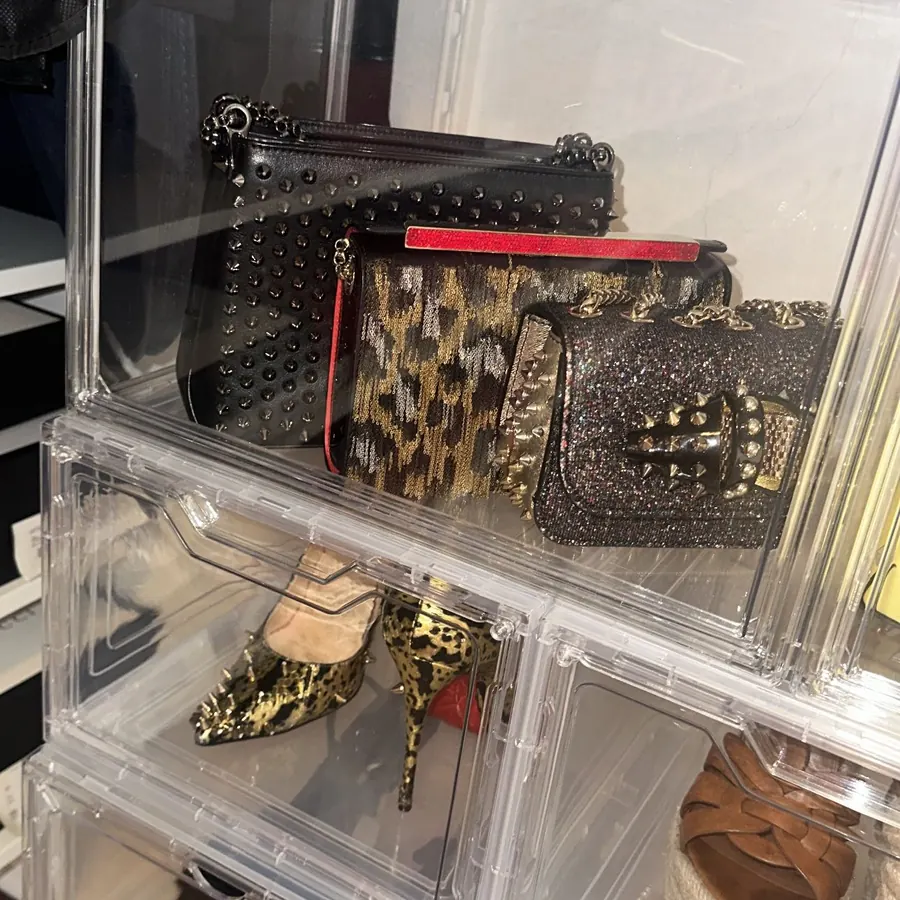 Handbags displayed in clear acrylic cases